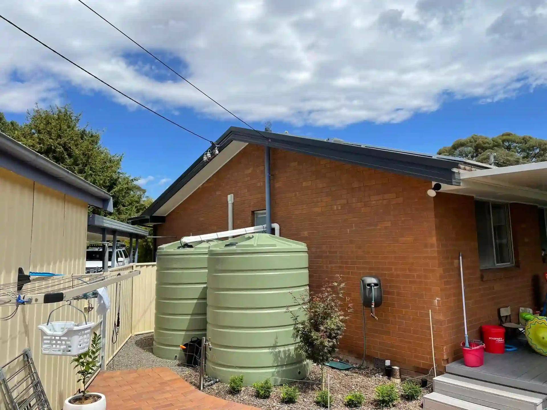 Roofline detail with new gutters, downpipes and fascia covers on the Duffy home