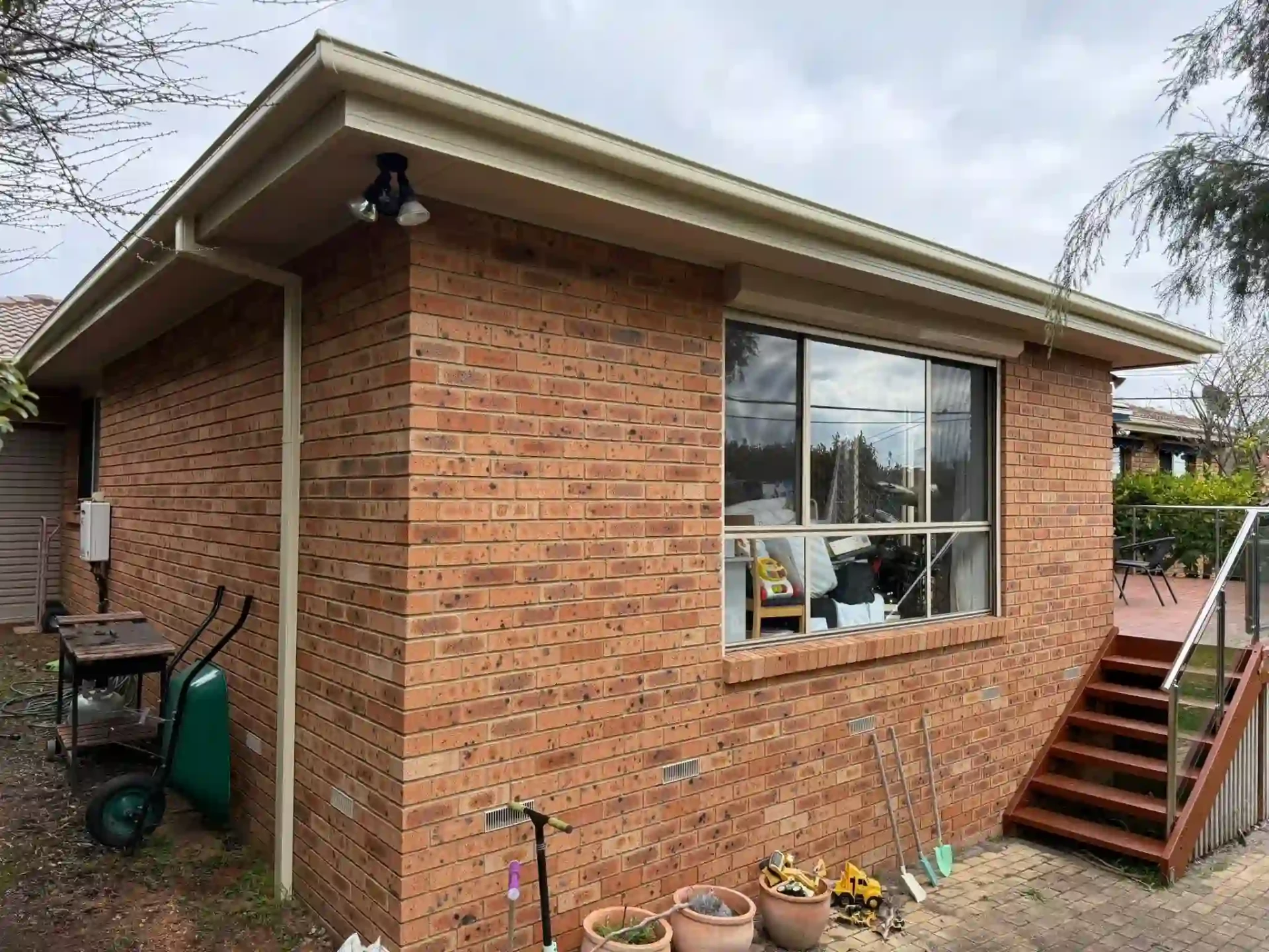 Back corner of the Wanniassa home showing new fascia covers, guttering and downpipes