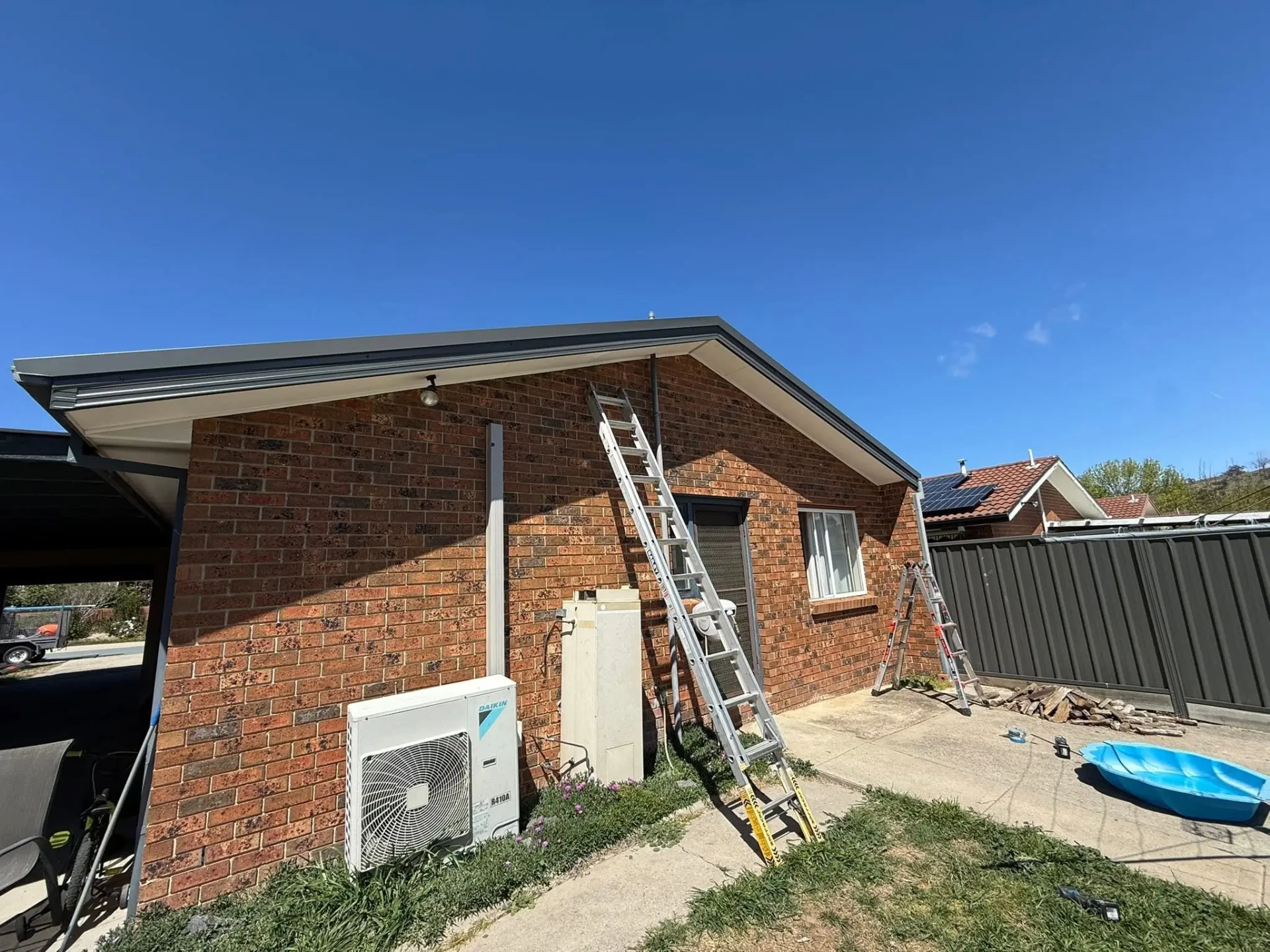 Side view of the Conder home with new guttering and downpipes installed